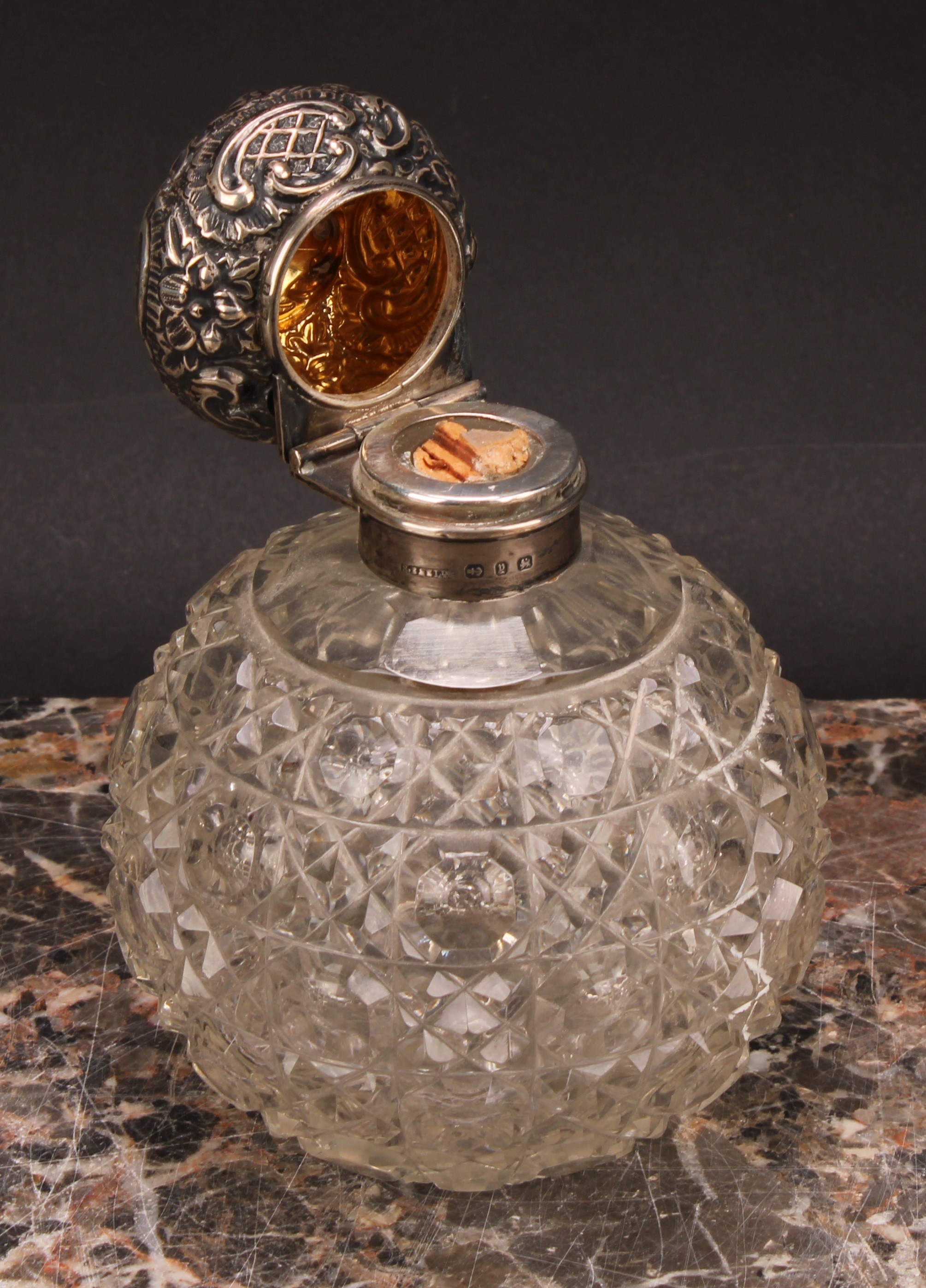 A Victorian silver mounted hobnail-cut globular scent bottle, hinged cover chased in the Rococo - Image 4 of 5