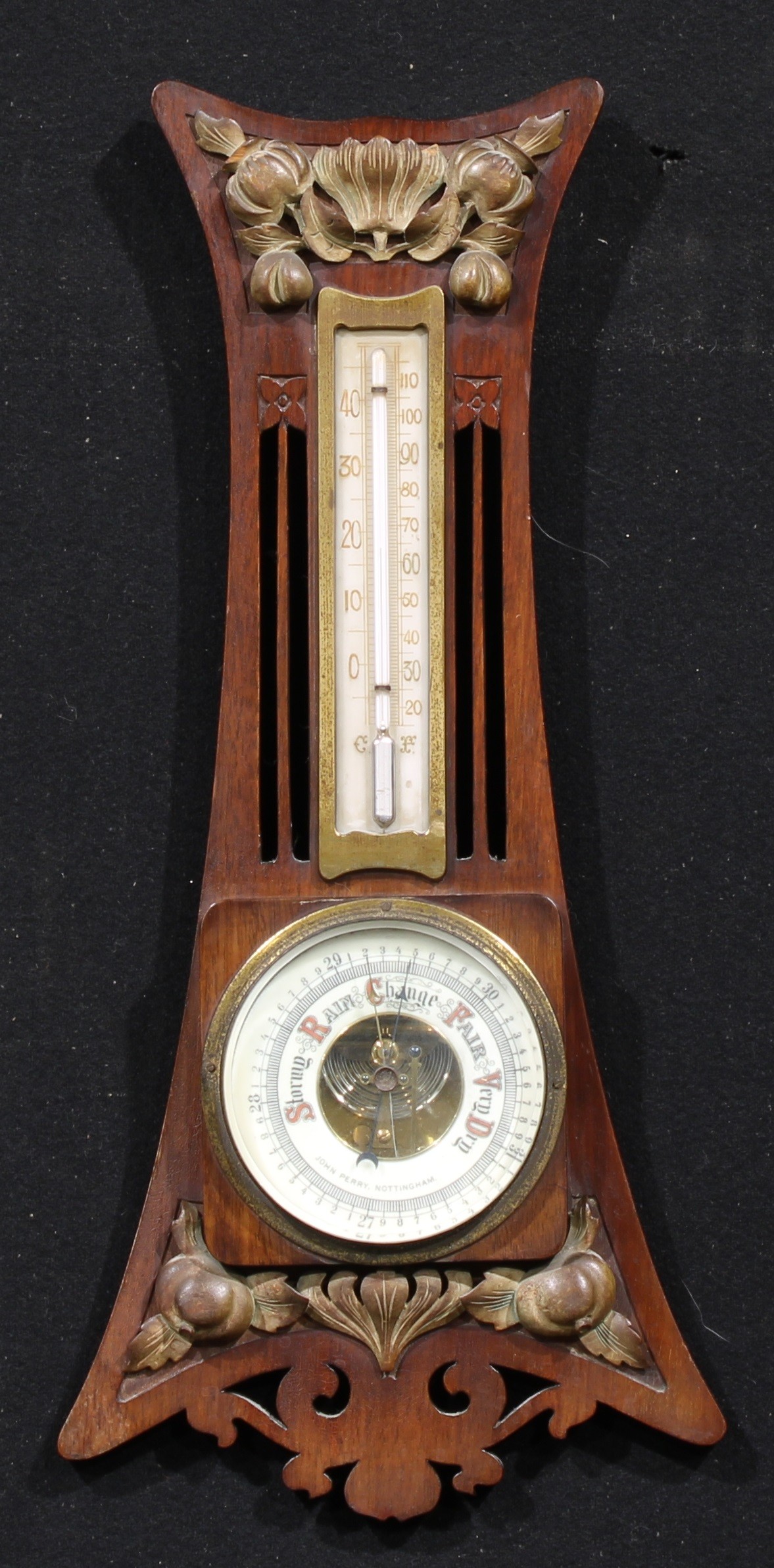 An Art Nouveau mahogany barometer, 10.5cm circular register inscribed JOHN PERRY, NOTTINGHAM, the