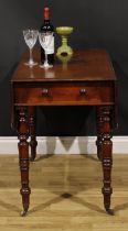 An early Victorian mahogany Pembroke table, rounded rectangular top with moulded edge and fall