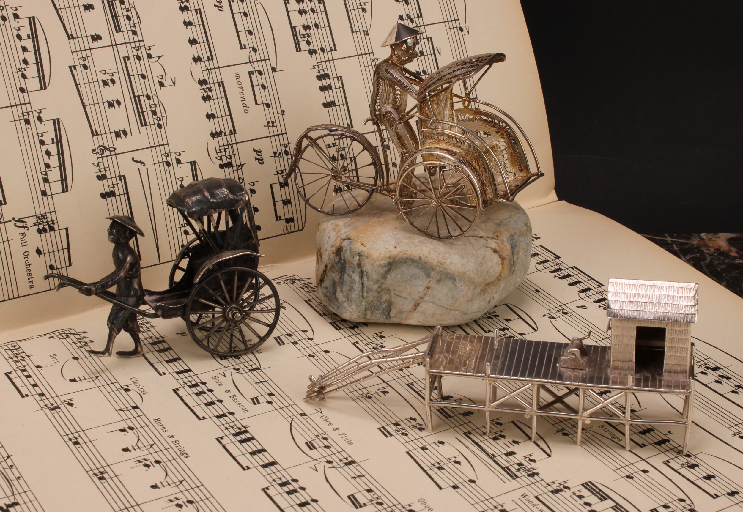 A Chinese silver miniature model, of a rickshaw, 7cm long, Wang Hing & Co, Hong Kong, c.1910; others