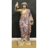A 19th century polychrome painted softwood and gesso floor-standing figure, carved as an allegory of