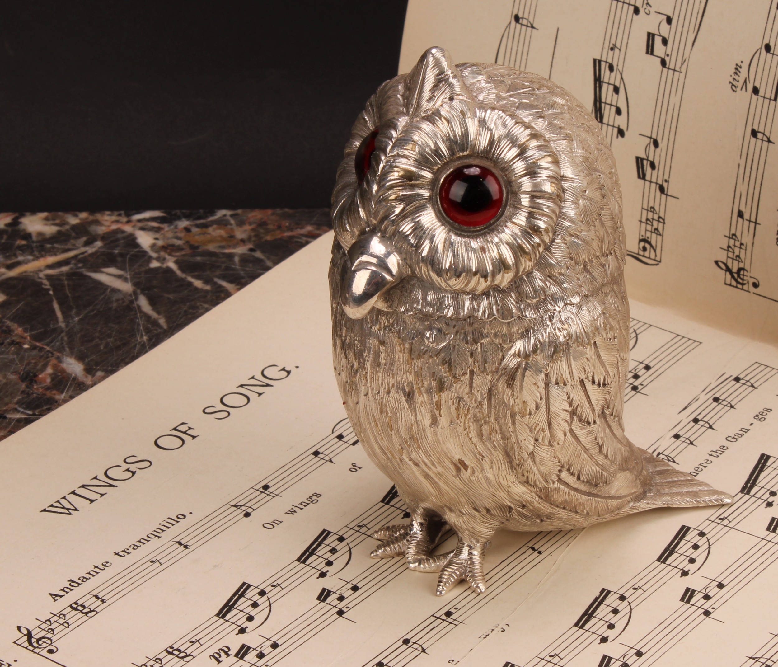 A large silver plated novelty mustard, as an owl, hinged cover, glass eyes, 12cm high