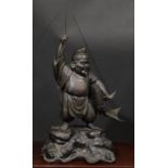 A large Japanese bronze figure, Ebisu, the Japanese god of fishermen and luck, 61cm high excluding