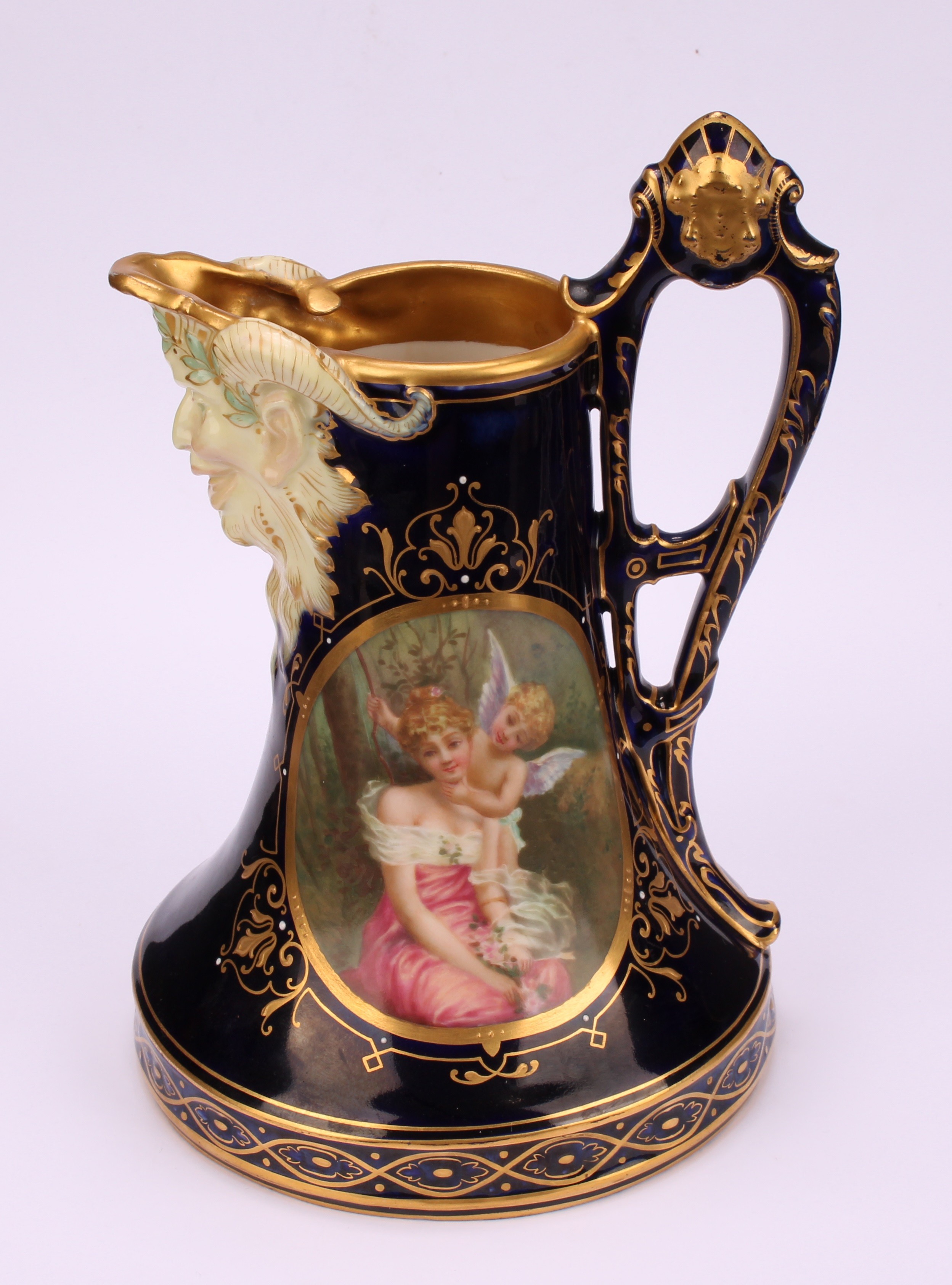 A Vienna porcelain jug, the central oval cartouche painted with Cupid and Psyche, Bacchic mask spot, - Image 2 of 5