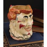 A Royal Doulton character jug, The Clown, designed by H. Fenton, decorated in polychrome with red