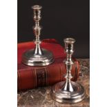 A pair of George I style silver table candlesticks, knopped pillars, dished bases, loaded, 18.5cm
