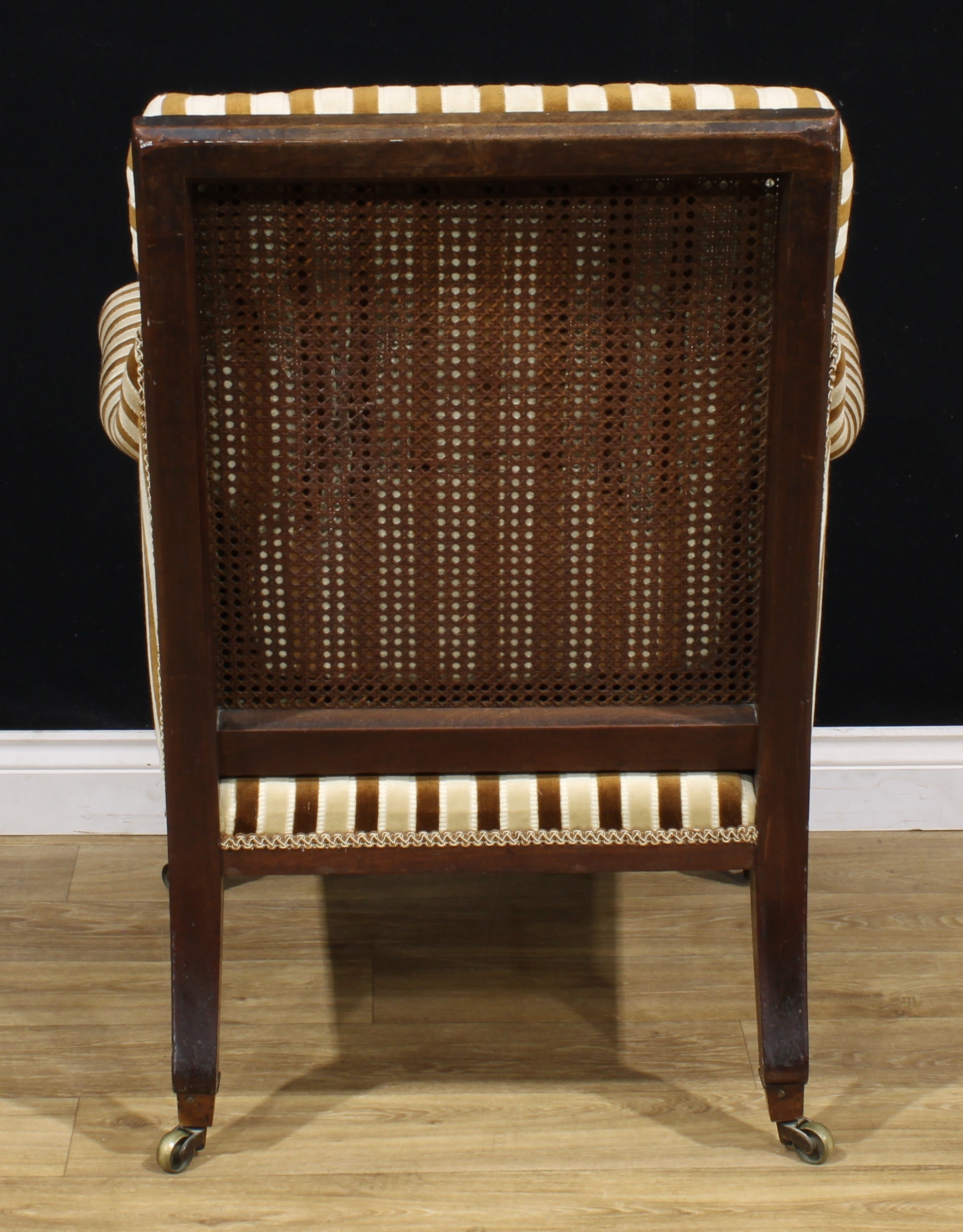 A George IV mahogany library chair, cane back, stuffed-over upholstery, turned forelegs, brass - Bild 4 aus 4