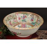 A Chinese famille rose bowl, painted in the typical Cantonese manner with figures of the court,