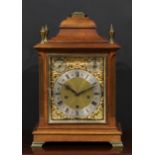 A George II Revival oak musical bracket clock, 19cm rectangular brass dial withg silvered chapter