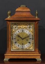 A George II Revival oak musical bracket clock, 19cm rectangular brass dial withg silvered chapter