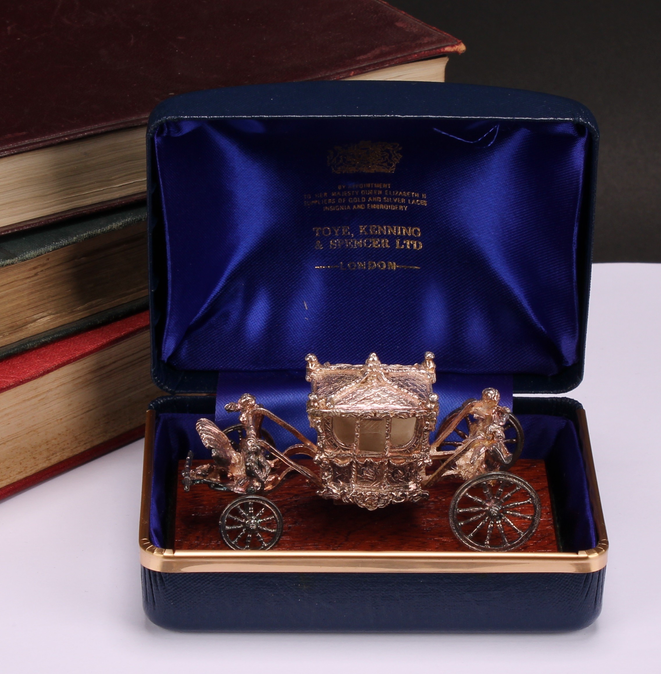 An Elizabeth II cast silver royal commemorative model, the State Coach, 7.5cm long, Birmingham 1977,