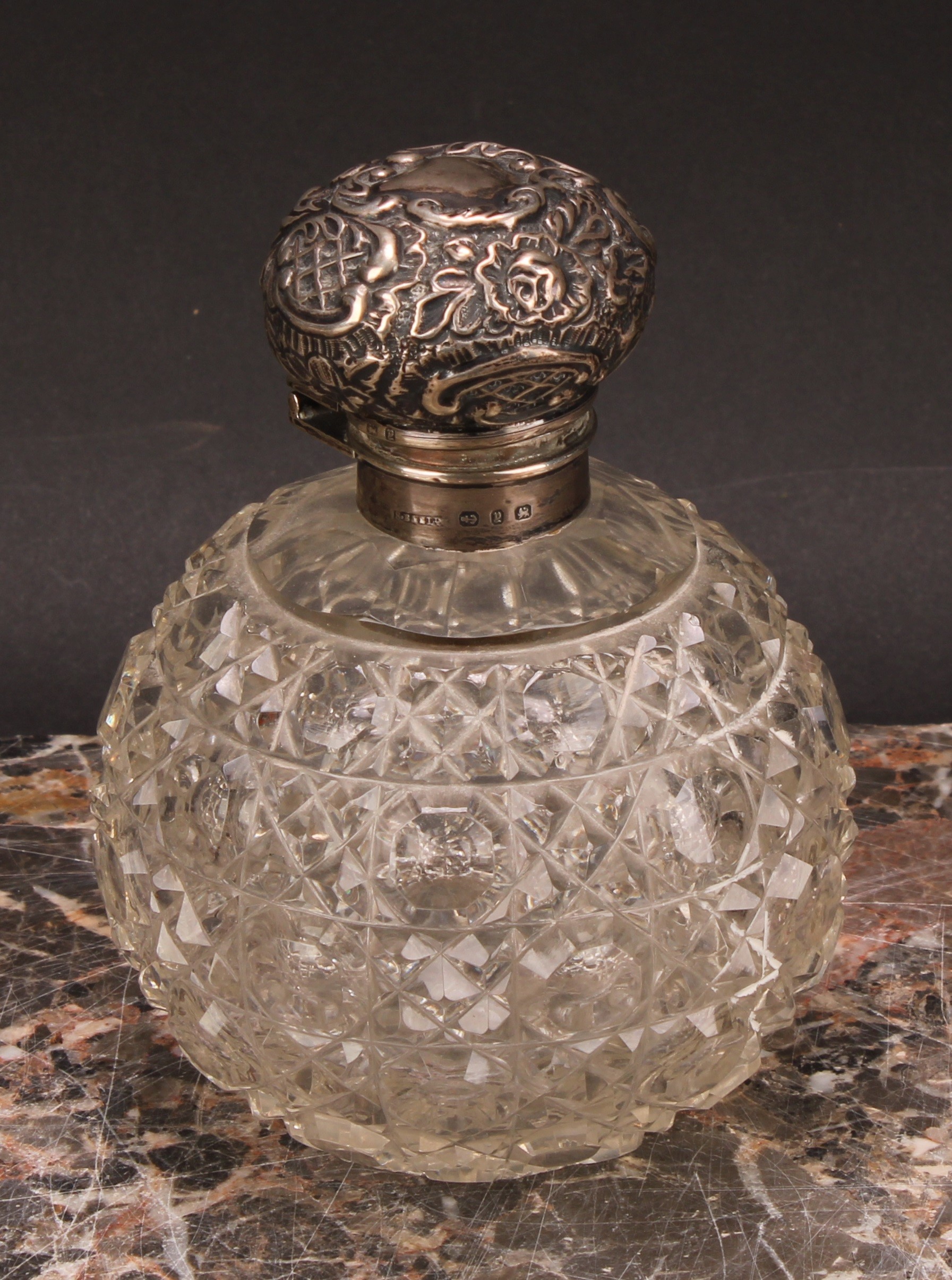 A Victorian silver mounted hobnail-cut globular scent bottle, hinged cover chased in the Rococo - Image 3 of 5