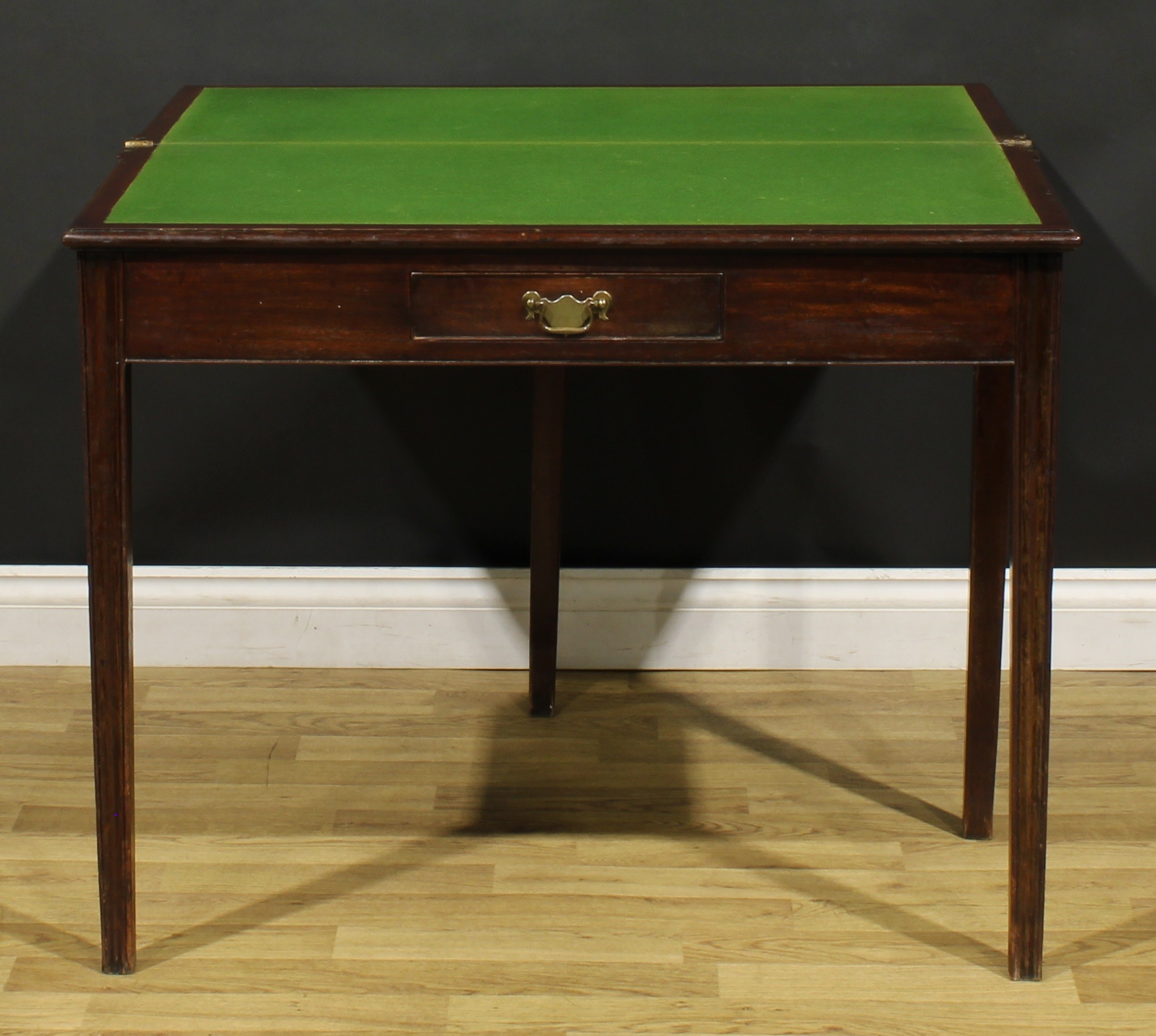 A George III mahogany card table, hinged top with moulded edge enclosing a baize lined playing - Image 3 of 7