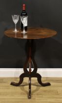 A George III mahogany tripod table, based on a design by Thomas Chippendale, circular tilting top,