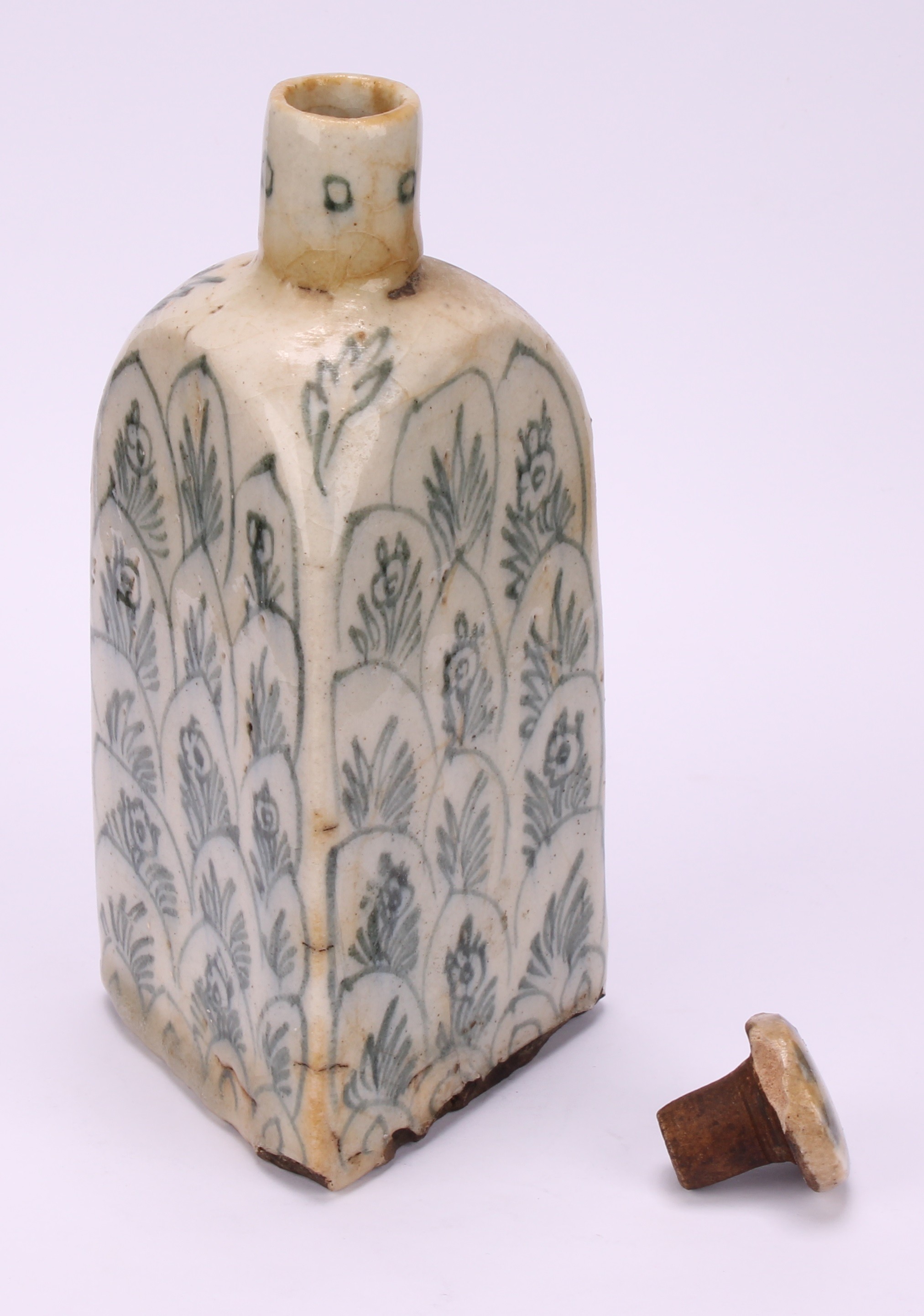 A Middle-Eastern tin-glazed earthenware triform flask, decorated with flowers and layered lotus, - Image 4 of 5