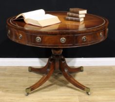 A Post-Regency mahogany drum table or rent table, circular top with inset tooled and gilt leather