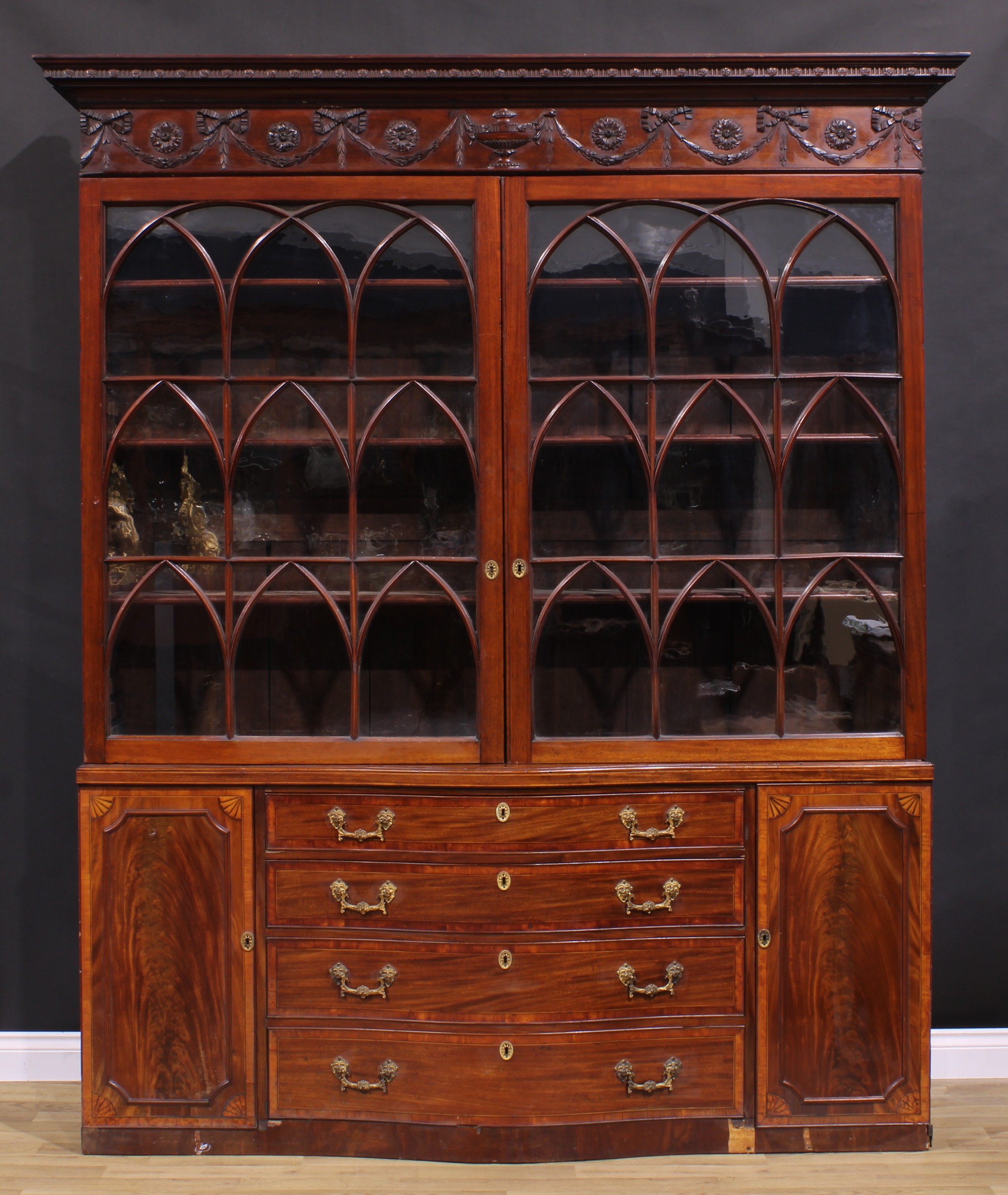 A 19th century Adam Revival mahogany library bookcase, outswept cornice above a deep frieze carved - Image 2 of 2