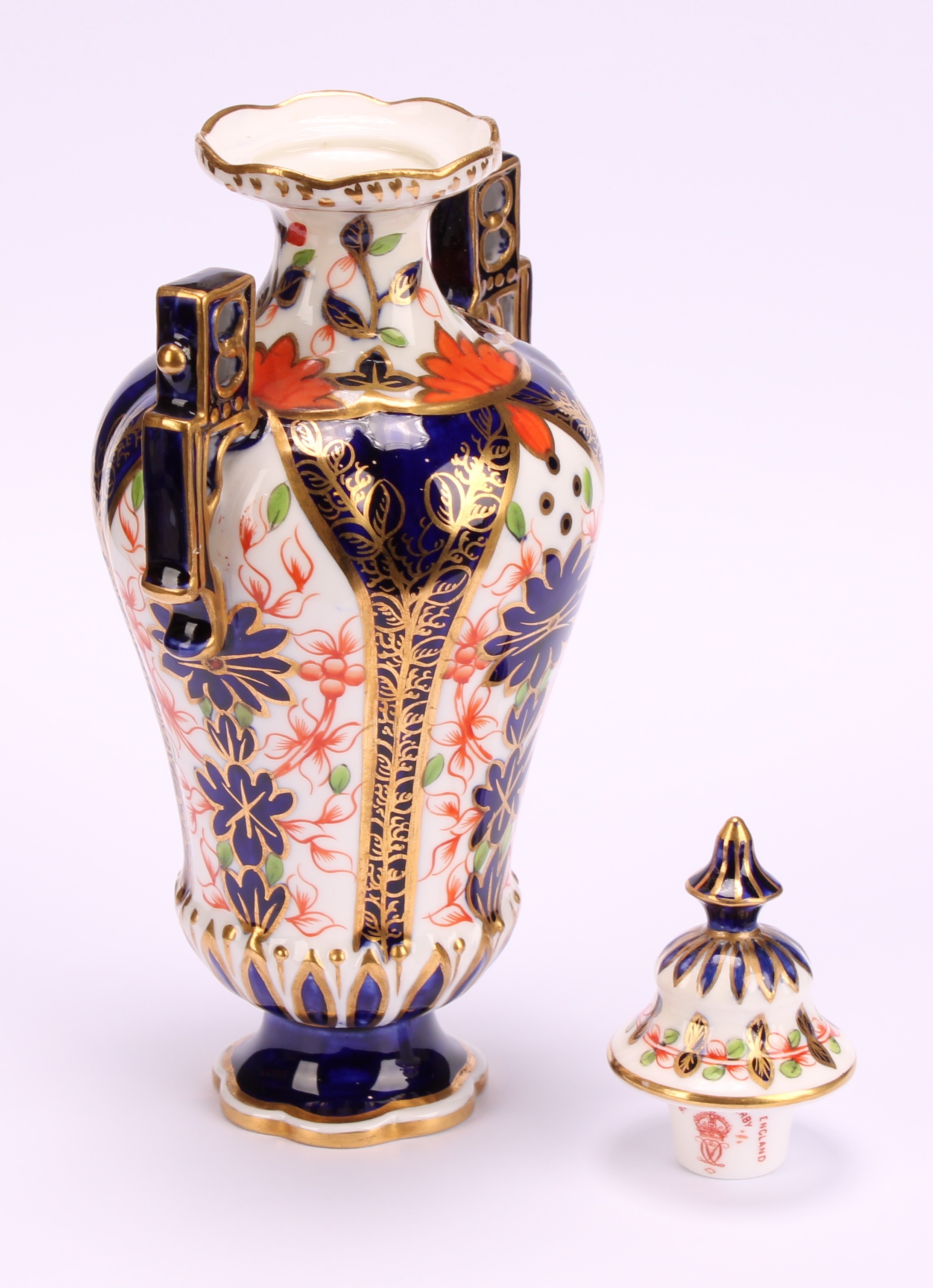 A Royal Crown Derby Imari elongated ogee shaped two-handled vase and cover, Japanesque angular - Image 8 of 9