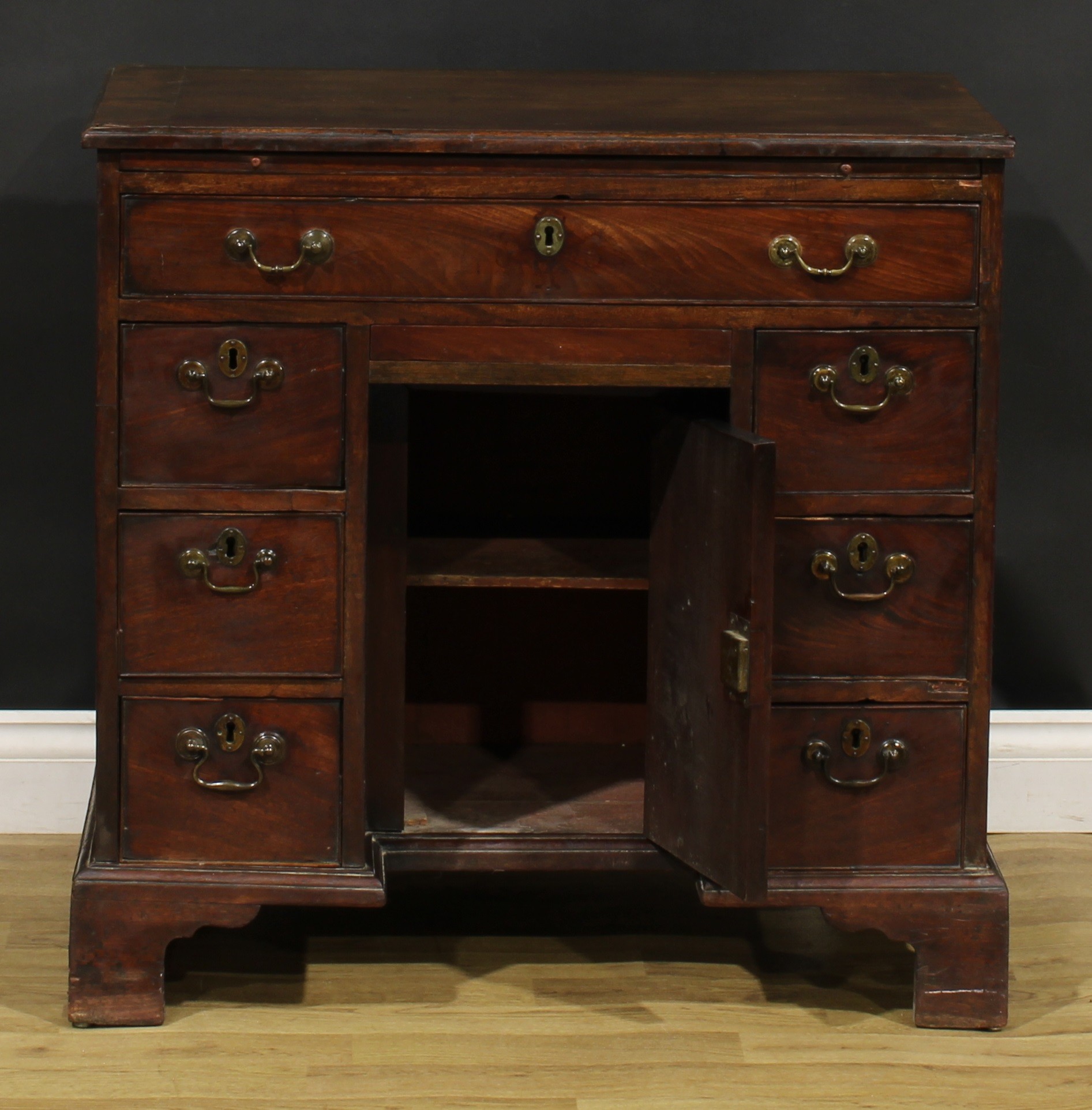 A George III mahogany kneehole desk, slightly oversailing top with moulded edge above a slide and - Image 3 of 8