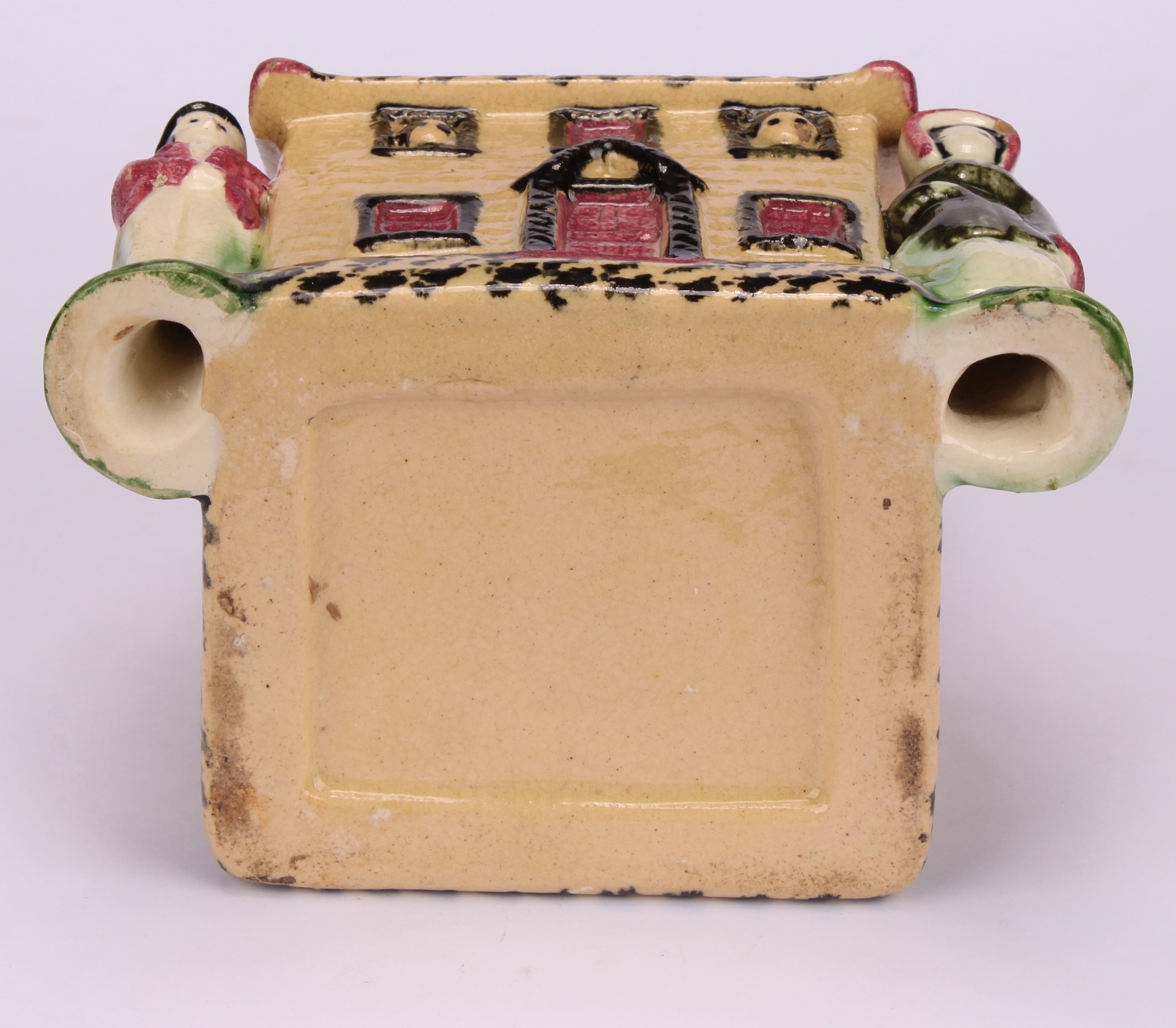 A Yorkshire Prattware polychrome spongeware cottage money box, moulded in relief with a figure to - Image 5 of 5