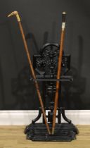 An Aesthetic Movement style walking stick or umbrella stand, cast in the manner of Christopher