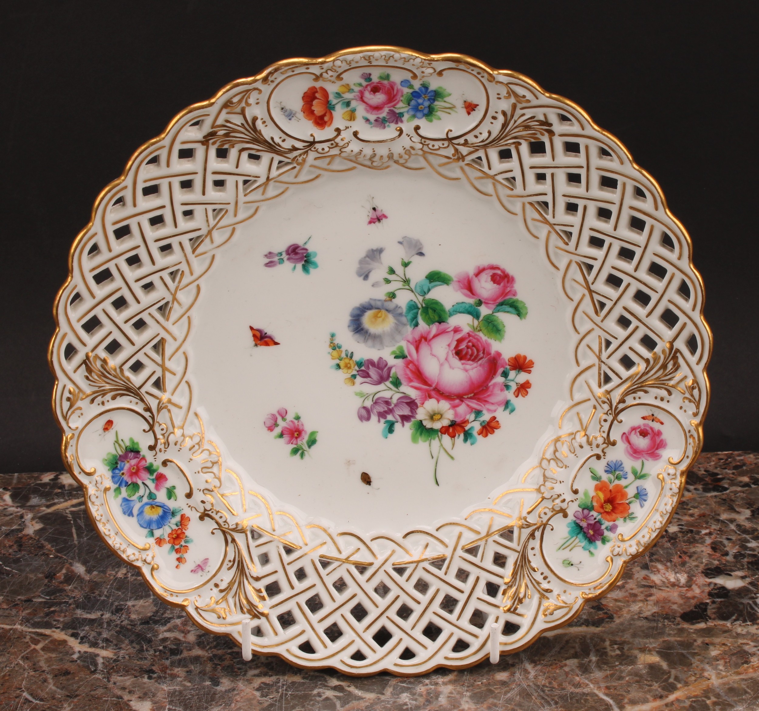 A set of six German porcelain shaped circular plates, decorated with flowers, pierced borders picked - Image 2 of 13