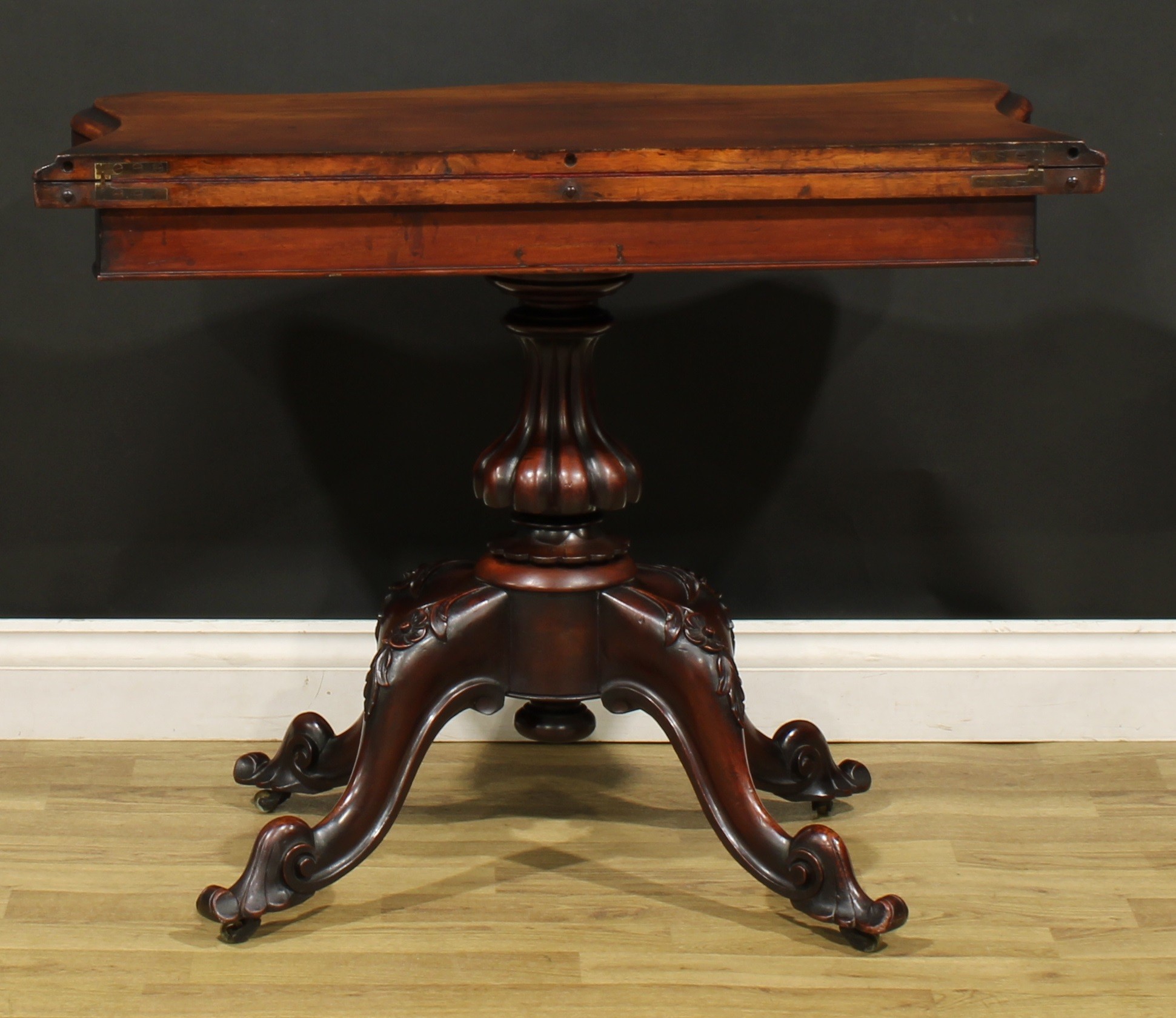 A Victorian mahogany serpentine card table, hinged top with moulded edge enclosing a baize lined - Image 6 of 6