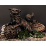 A Japanese bronzed metal koro or incense burner, as a Chinese guardian lion, 32.5cm high