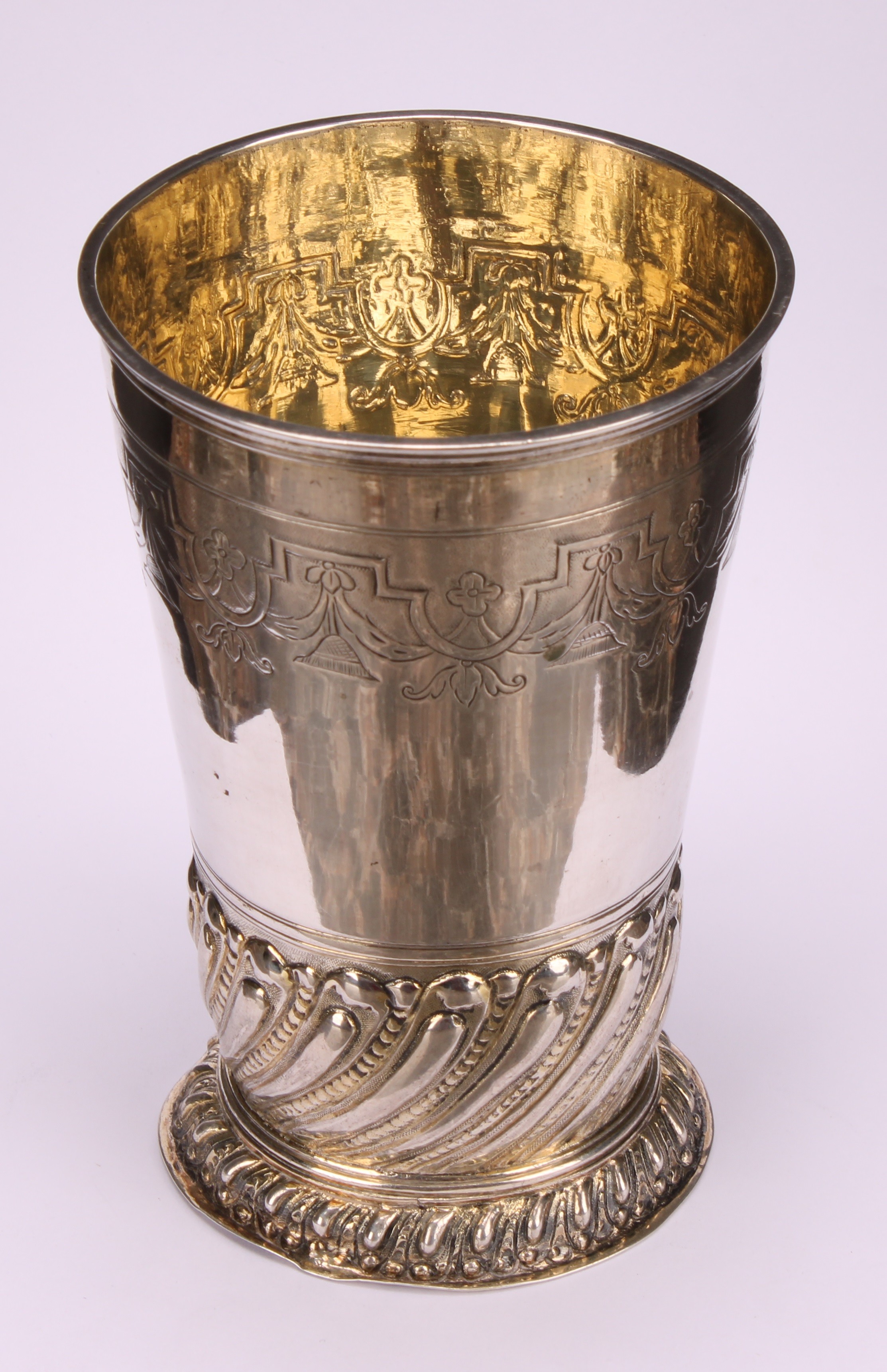 A German silver tapered cylindrical beaker, chased with a band of strapwork and leafy pendants, - Image 3 of 4
