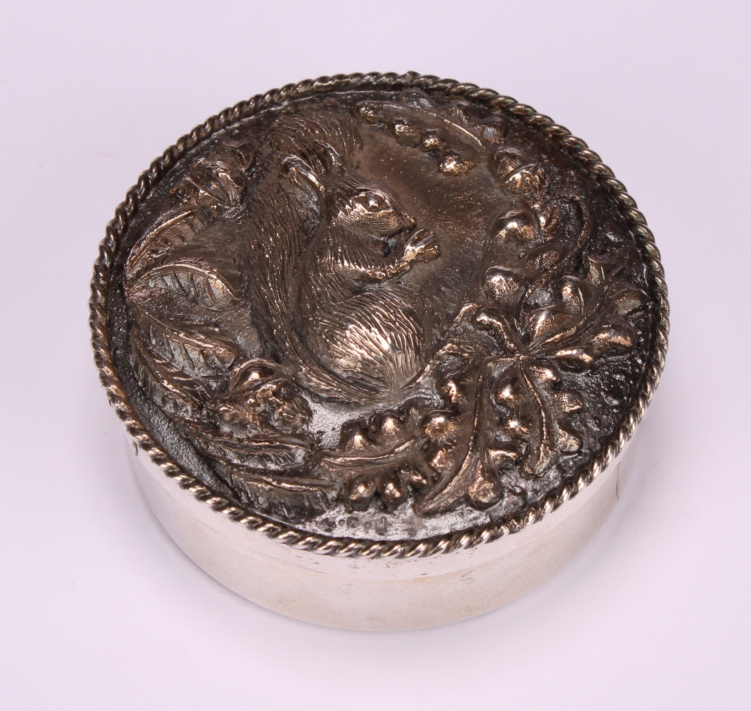 An Elizabeth II silver circular trinket box, the push-fitting cover in relief with a squirrel, - Image 3 of 5