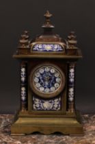 A late 19th century French porcelain mounted gilt brass architectural mantel clock, the 9cm circular