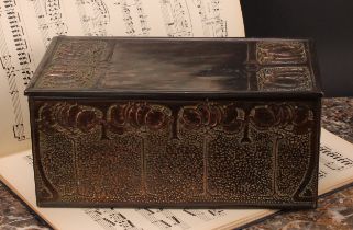 An Arts and Crafts copper rectangular caddy, decorated in relief in the Art Nouveau manner with