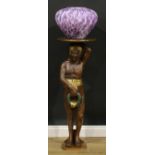 Interior Design - a 19th century style parcel-gilt figural torchere, in the blackamoor manner, as