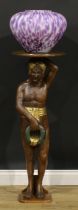 Interior Design - a 19th century style parcel-gilt figural torchere, in the blackamoor manner, as