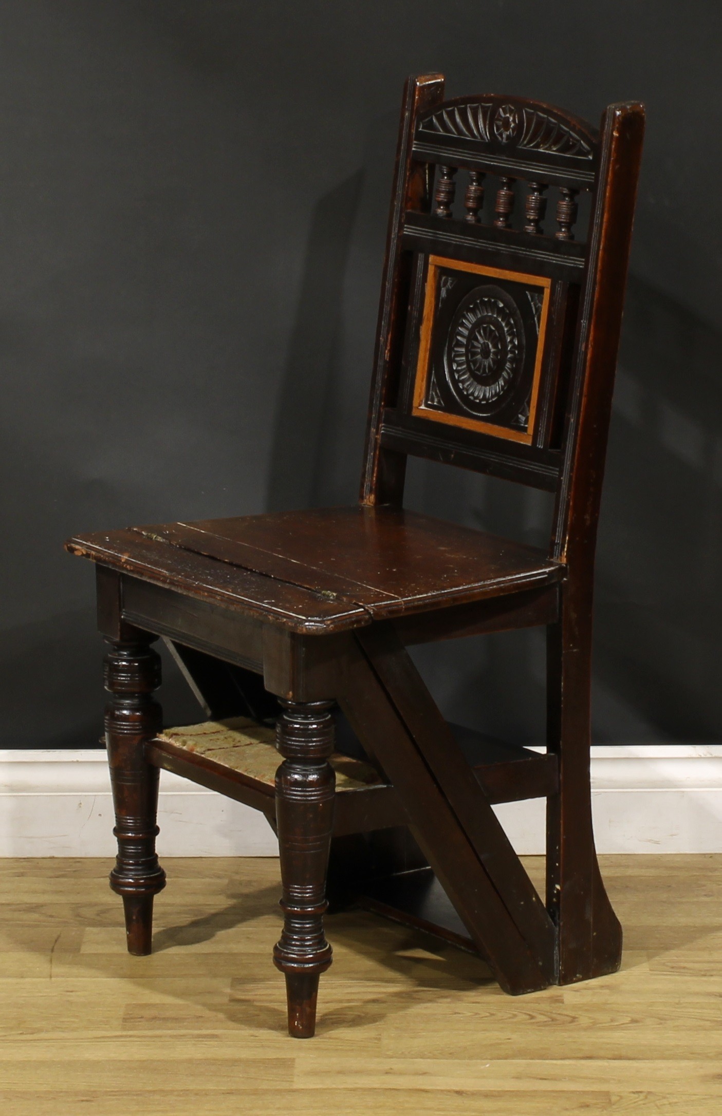 A late Victorian Aesthetic Movement metamorphic library step chair, spindle back with carved central - Image 3 of 6