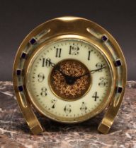 An early 20th century brass desk timepiece, of equestrian interest, 8cm circular clock dial