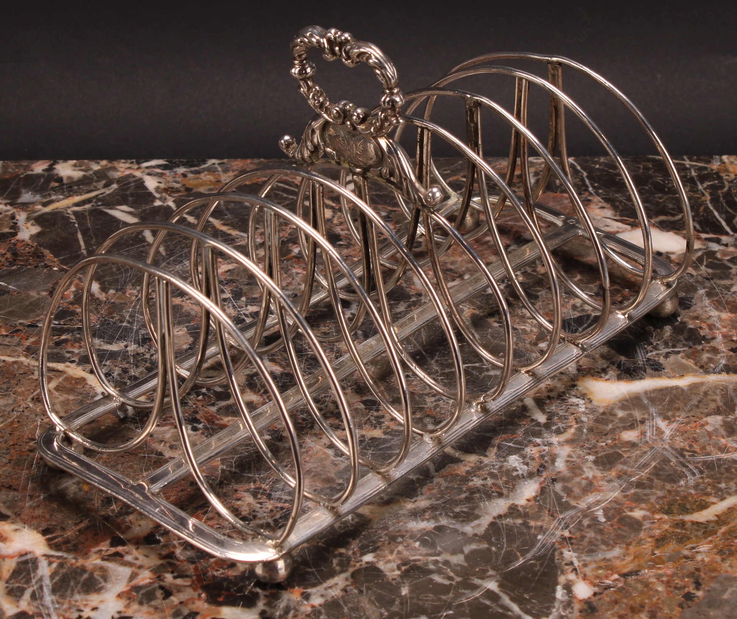 A George IV silver rounded rectangular nine-bar toast rack, of Scottish interest, leafy-loop handle, - Image 2 of 3