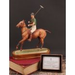 A Royal Worcester equestrian figure, H.R.H The Duke of Edinburgh, playing polo, limited edition no.