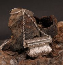 An early Victorian silver novelty bag shaped castle top vinaigrette, the hinged cover with a view of