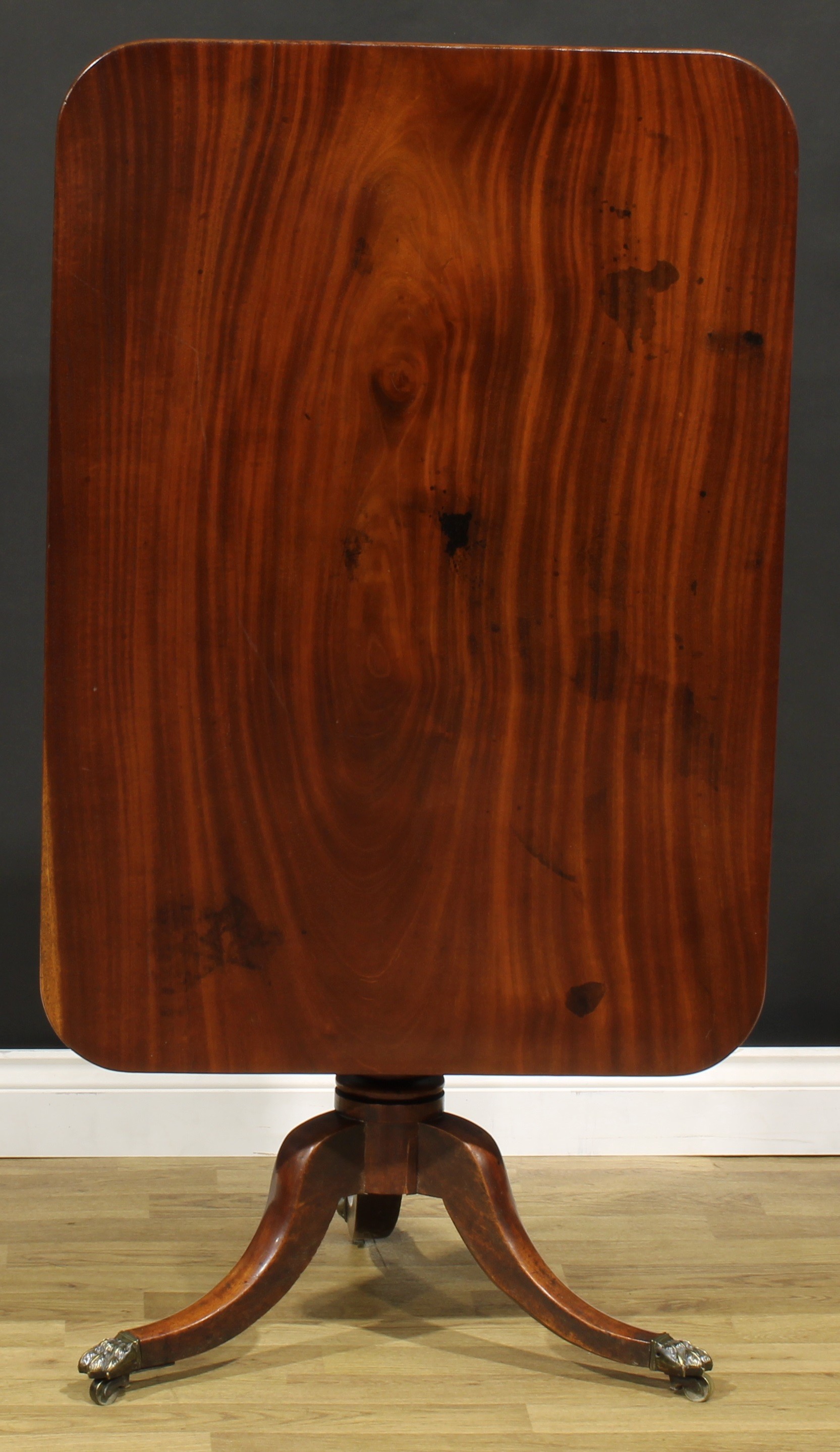 A Regency mahogany tripod supper table, rounded rectangular tilting top with channelled edge, turned - Image 3 of 4
