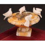 An Italian Grand Tour Sienna marble model, The Capitoline Doves, after the antique, 15cm diameter,