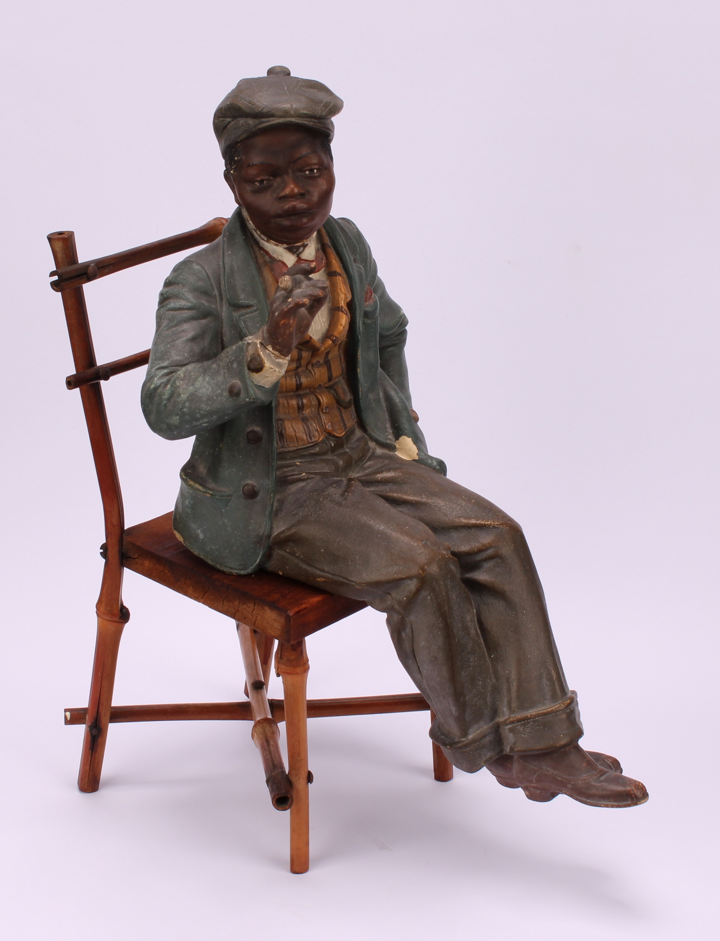 An early 20th century Austrian terracotta model, of a young African-American boy, finely dressed and - Image 2 of 5