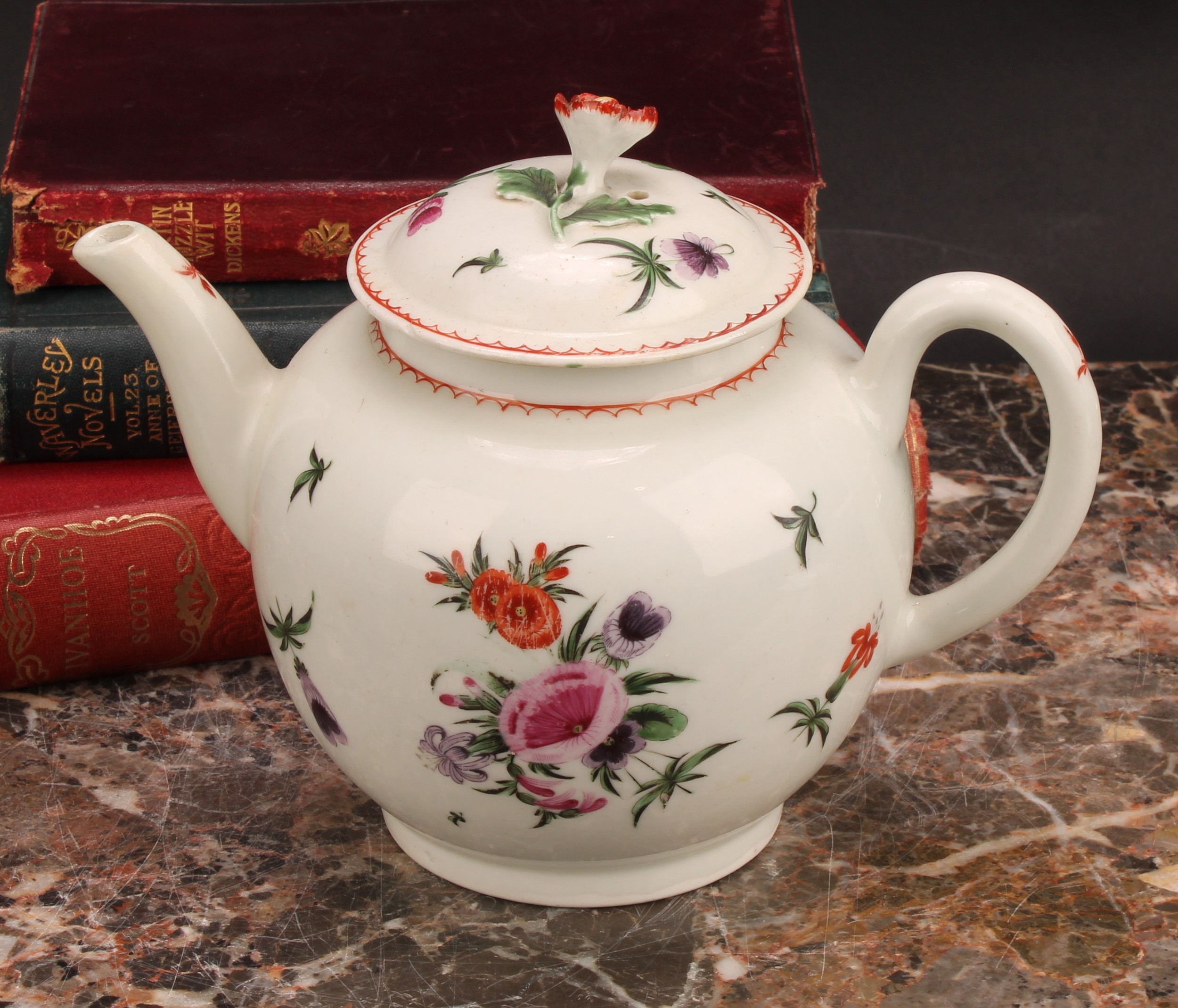 A Worcester globular teapot and cover, painted with floral bouquets and sprigs in polychrome, line