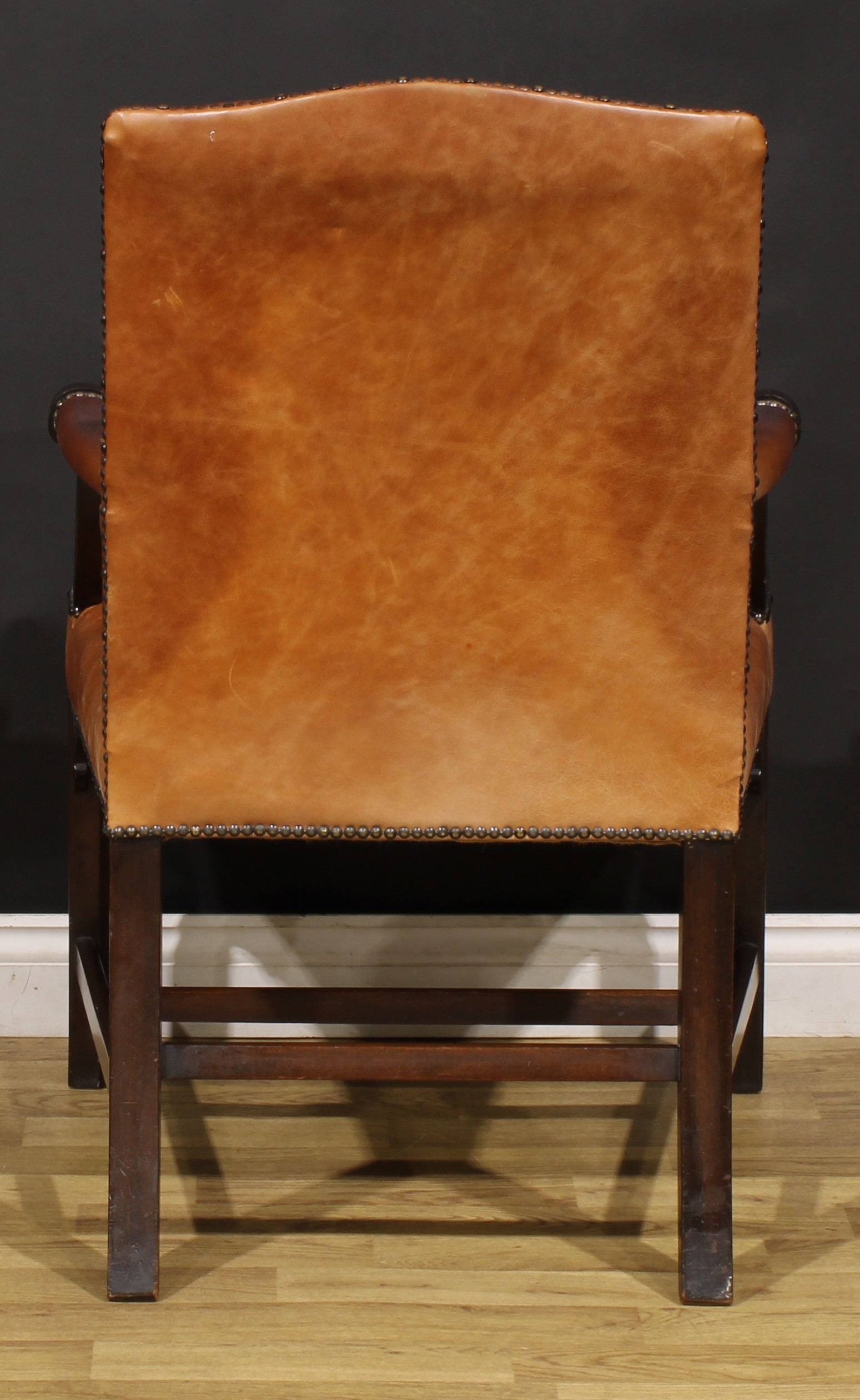 A Chippendale Revival mahogany Gainsborough armchair, stuffed-over leather upholstery, the hand - Image 4 of 4