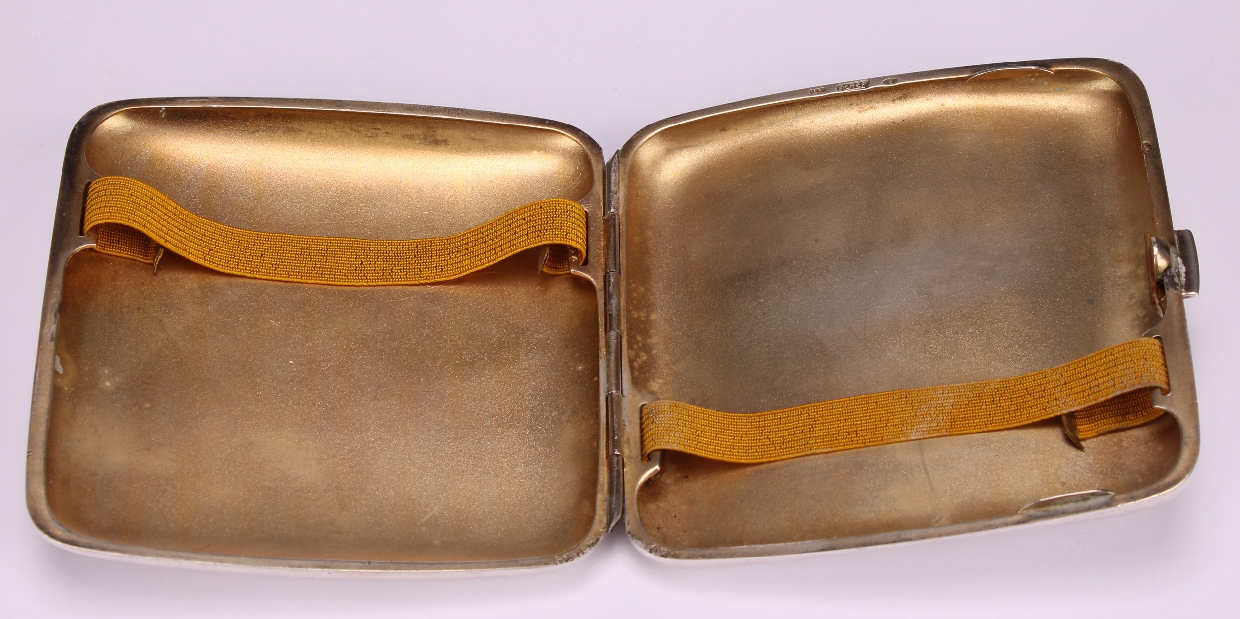 An early 20th century silver and enamel curved rounded rectangular cigarette case, hinged cover with - Image 4 of 5