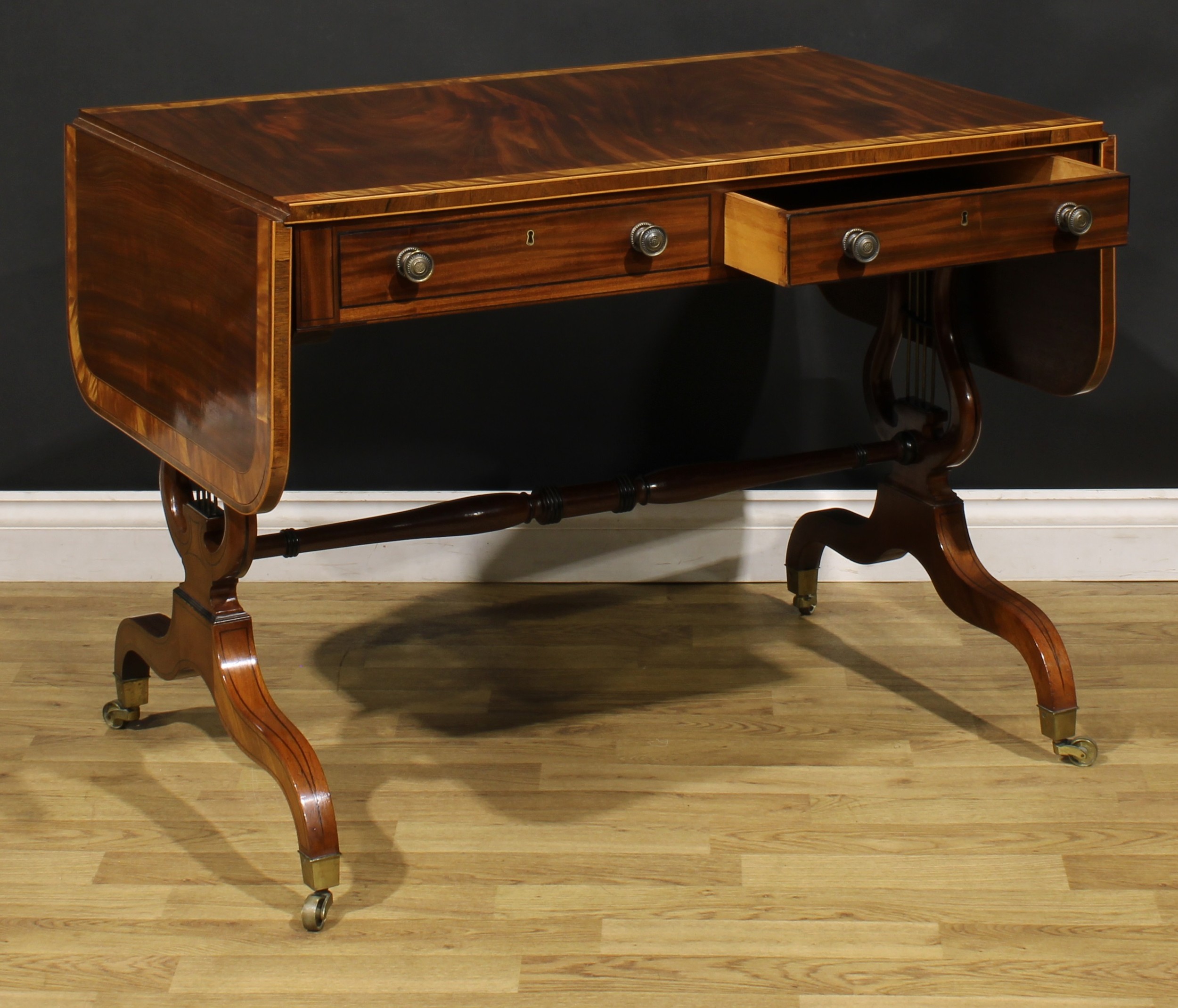 A Regency mahogany sofa table, rosewood crossbanded satinwood banded rounded rectangular top with - Image 5 of 6