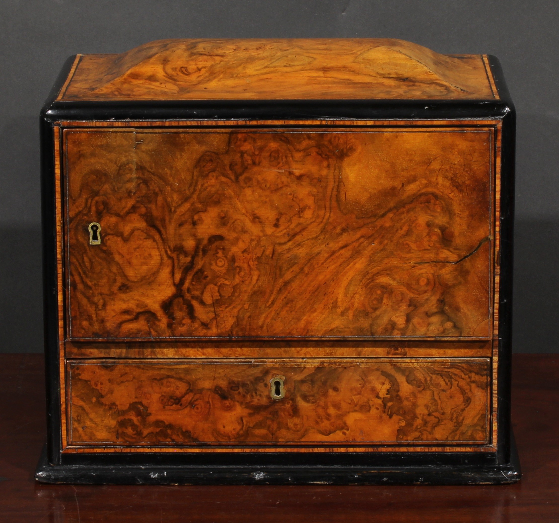 A Victorian burr walnut table-top work box, sarcophagus cresting above a revolving compartment and a
