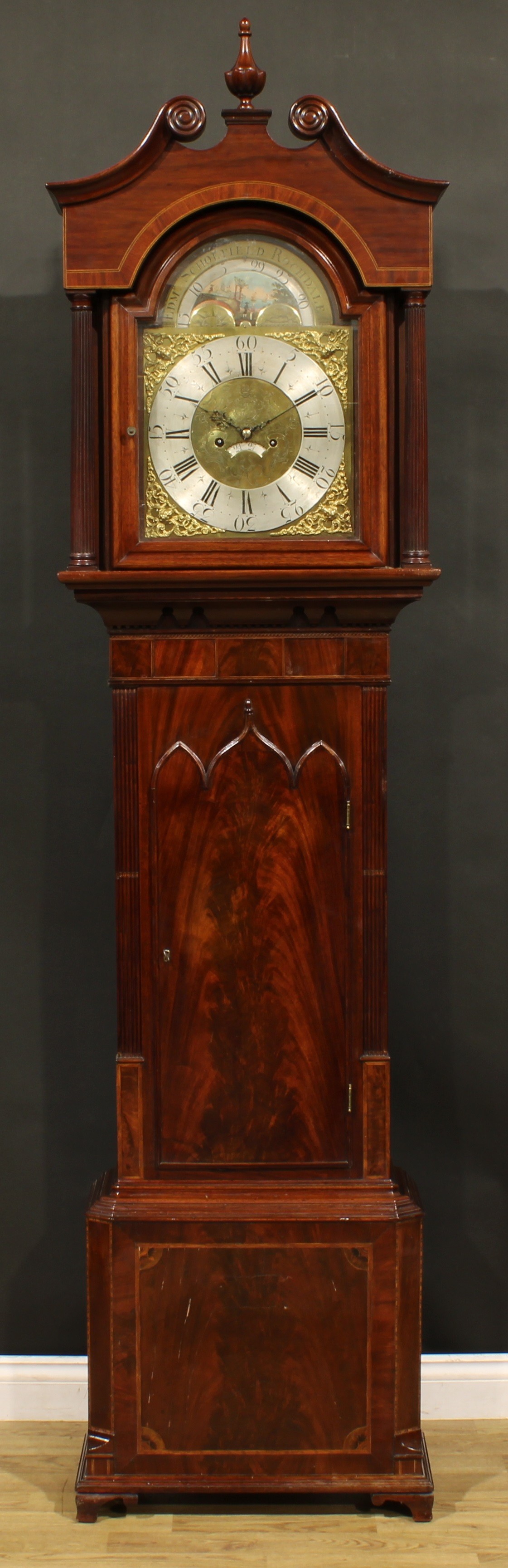 A George IV Lancashire mahogany longcase clock, 34cm arched brass dial inscribed EDMD SCHOLFIELD,