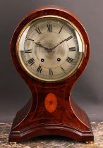 A large Edwardian mahogany balloon shaped mantel clock, 19cm silvered dial inscribed with Roman