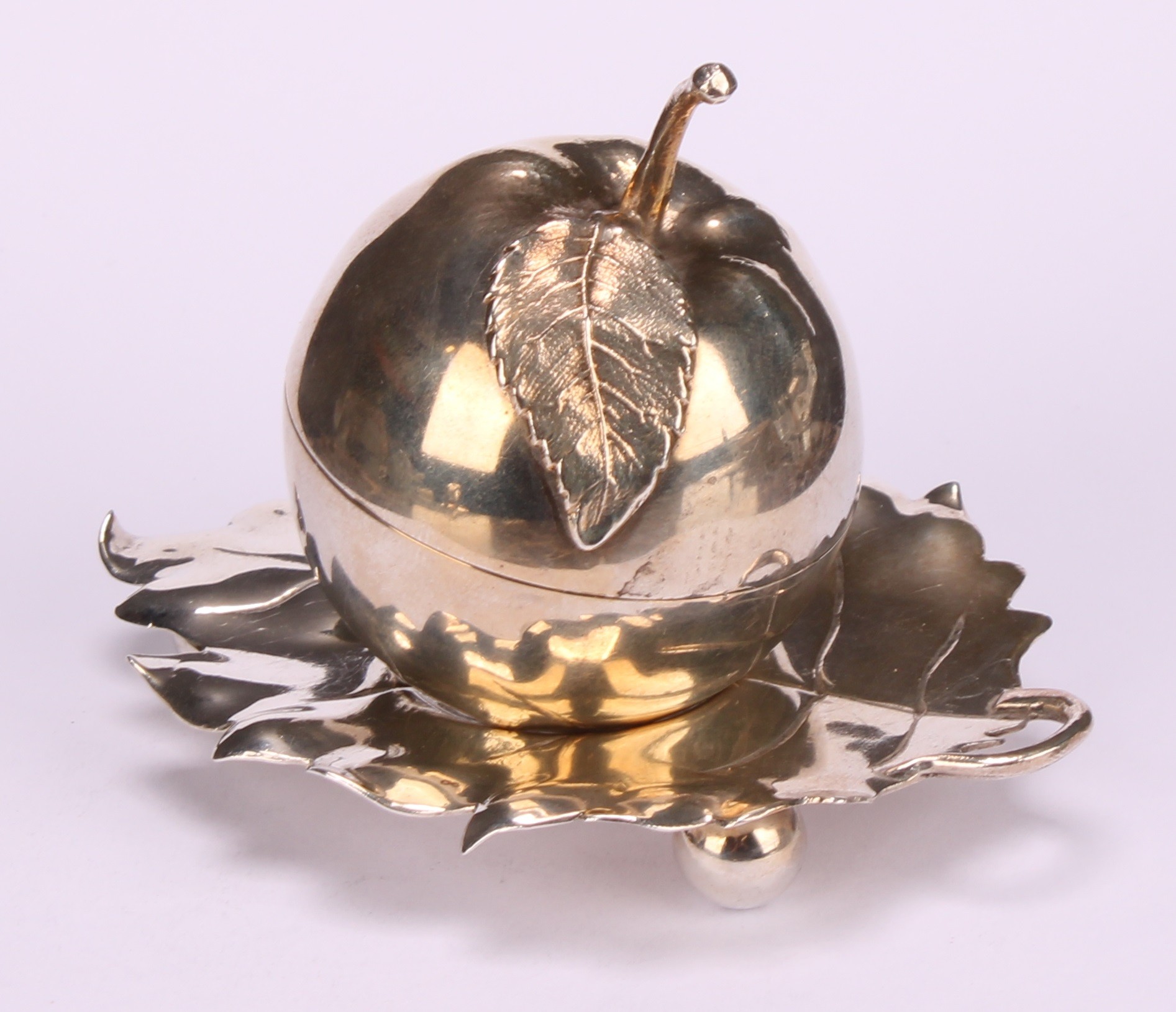 A pair of Elizabeth II silver novelty condiments and stands, modelled as apples, the cast leaf - Image 11 of 16